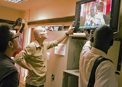 Author Dale Willman and coworkers record a speech from former South Sudan rebel leader Riek Machar as he returned to Juba and his position as vice president.